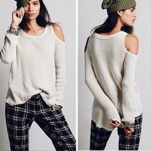 Raw edged cold shoulder sweater